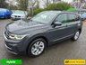 USED 2022 22 VOLKSWAGEN TIGUAN 1.4 TSI Life Plug-in Hybrid SUV Automatic in Grey with 63,500 miles, Euro 6, Adaptive cruise, Sat Nav, Front and Rear sensors and Reverse camera. This 2022 Volkswagen Tiguan TSI Life offers peace of mind with a 12 month MOT provided on purchase and a 3 month warranty.  This Euro 6 compliant, 1.4 litre petrol plug in hybrid is presented in the Life trim.  It comes equipped with a useful rear view camera that includes parking assistance, and for your comfort, it features 3 zone electronic climate control with independent rear air conditioning.  Long journeys are made easier with adaptive cruise control, and you can stay connected and entert