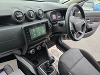 USED 2023 73 DACIA DUSTER 1.3 TCe Extreme SUV in Grey with 67,300 miles, Euro 6, Full main dealer history, 6 Speed Manual gearbox, Sat Nav, Heated Seats, Rear camera and more. This 2023 Dacia Duster TCe EXTREME is a standout example, boasting a full dealership service history and having had only one owner from new. This particular EXTREME trim model is equipped with a responsive 1.3L Petrol Engine, meeting Euro 6 emission standards. For your peace of mind, it comes with a 3 month warranty and a 12 month MOT provided on purchase. The vehicle has been meticulously maintained, with its last service recorded at 57,000 miles on 16th May 2026, ensuring its continued roadwor