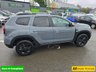 USED 2023 73 DACIA DUSTER 1.3 TCe Extreme SUV in Grey with 67,300 miles, Euro 6, Full main dealer history, 6 Speed Manual gearbox, Sat Nav, Heated Seats, Rear camera and more. This 2023 Dacia Duster TCe EXTREME is a standout example, boasting a full dealership service history and having had only one owner from new. This particular EXTREME trim model is equipped with a responsive 1.3L Petrol Engine, meeting Euro 6 emission standards. For your peace of mind, it comes with a 3 month warranty and a 12 month MOT provided on purchase. The vehicle has been meticulously maintained, with its last service recorded at 57,000 miles on 16th May 2026, ensuring its continued roadwor