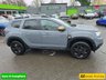 USED 2023 73 DACIA DUSTER 1.3 TCe Extreme SUV in Grey with 67,300 miles, Euro 6, Full main dealer history, 6 Speed Manual gearbox, Sat Nav, Heated Seats, Rear camera and more. This 2023 Dacia Duster TCe EXTREME is a standout example, boasting a full dealership service history and having had only one owner from new. This particular EXTREME trim model is equipped with a responsive 1.3L Petrol Engine, meeting Euro 6 emission standards. For your peace of mind, it comes with a 3 month warranty and a 12 month MOT provided on purchase. The vehicle has been meticulously maintained, with its last service recorded at 57,000 miles on 16th May 2026, ensuring its continued roadwor