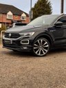 USED 2021 21 VOLKSWAGEN T-ROC 1.5 TSI GPF EVO R-Line SUV 5dr Petrol DSG Euro 6 (s/s) (150 ps) Finished in DEEP BLACK and HEATED ALCANTARA Sports Trim. This T-Roc is for those who want a compact SUV with smart styling and a good level of practicality. This Golf based SUV is both practical and fun to drive. Features include, Heated Seats, Virtual Dash, Cruise Control, Park Sensors, B/Tooth, Apple Play, 19" Alloys, DAB Radio, Sports Trim and much more. JUST SERVICED and 12 MONTHS MOT with 2 KEYS.