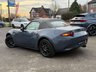USED 2021 21 MAZDA MX-5 1.5 SKYACTIV-G R-Sport Convertible 2dr Petrol Manual Euro 6 (s/s) (132 ps) Finished in POLYMETAL GREY MET with sport LEATHER TRIM. This MX-5 is much more practical than you would expect of a sports car, with a reasonable boot and space for two adults. It is a great little sports car for the money with features that include, Sat Nav, DAB Radio, BOSE Speakers, Leather, Cruise control, B/Tooth, Remote Locking, Alloys and much more. Dealer Serviced at 4832 miles, 9822 miles, 19098 miles and on arrival at 26155 miles.