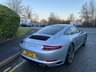 USED 2018 18 PORSCHE 911 3.0T 991 Carrera S Coupe 2dr Petrol PDK Euro 6 (s/s) (420 ps)-Factory Extras Worth �&pound;7,500.00-Superb Example-Finished In Rhodium Silver Metallic-Heated Black Leather Upholstery-Rev Counter Dial Face In Black-20 Inch Carrera Classic Alloy Wheels With Matching Pirelli P Zero Tyres-Heated Multifunction Steering Wheel-Front & Rear Park Assist-Electric Slide & Tilt Glass Sunroof-Electric Folding Exterior Door Mirrors-Isofix-Bose Surround Sound System-Sport Chrono Package-Factory Privacy Glass To Rear Side Windows & Rear Window-Porsche Crest On Headrests-Ready To Be Enjoyed For That European Road Trip... 
