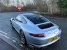 USED 2018 18 PORSCHE 911 3.0T 991 Carrera S Coupe 2dr Petrol PDK Euro 6 (s/s) (420 ps)-Factory Extras Worth �&pound;7,500.00-Superb Example-Finished In Rhodium Silver Metallic-Heated Black Leather Upholstery-Rev Counter Dial Face In Black-20 Inch Carrera Classic Alloy Wheels With Matching Pirelli P Zero Tyres-Heated Multifunction Steering Wheel-Front & Rear Park Assist-Electric Slide & Tilt Glass Sunroof-Electric Folding Exterior Door Mirrors-Isofix-Bose Surround Sound System-Sport Chrono Package-Factory Privacy Glass To Rear Side Windows & Rear Window-Porsche Crest On Headrests-Ready To Be Enjoyed For That European Road Trip... 