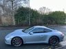 USED 2018 18 PORSCHE 911 3.0T 991 Carrera S Coupe 2dr Petrol PDK Euro 6 (s/s) (420 ps)-Factory Extras Worth �&pound;7,500.00-Superb Example-Finished In Rhodium Silver Metallic-Heated Black Leather Upholstery-Rev Counter Dial Face In Black-20 Inch Carrera Classic Alloy Wheels With Matching Pirelli P Zero Tyres-Heated Multifunction Steering Wheel-Front & Rear Park Assist-Electric Slide & Tilt Glass Sunroof-Electric Folding Exterior Door Mirrors-Isofix-Bose Surround Sound System-Sport Chrono Package-Factory Privacy Glass To Rear Side Windows & Rear Window-Porsche Crest On Headrests-Ready To Be Enjoyed For That European Road Trip... 