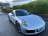 USED 2018 18 PORSCHE 911 3.0T 991 Carrera S Coupe 2dr Petrol PDK Euro 6 (s/s) (420 ps)-Factory Extras Worth �&pound;7,500.00-Superb Example-Finished In Rhodium Silver Metallic-Heated Black Leather Upholstery-Rev Counter Dial Face In Black-20 Inch Carrera Classic Alloy Wheels With Matching Pirelli P Zero Tyres-Heated Multifunction Steering Wheel-Front & Rear Park Assist-Electric Slide & Tilt Glass Sunroof-Electric Folding Exterior Door Mirrors-Isofix-Bose Surround Sound System-Sport Chrono Package-Factory Privacy Glass To Rear Side Windows & Rear Window-Porsche Crest On Headrests-Ready To Be Enjoyed For That European Road Trip... 