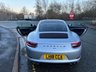 USED 2018 18 PORSCHE 911 3.0T 991 Carrera S Coupe 2dr Petrol PDK Euro 6 (s/s) (420 ps)-Factory Extras Worth �&pound;7,500.00-Superb Example-Finished In Rhodium Silver Metallic-Heated Black Leather Upholstery-Rev Counter Dial Face In Black-20 Inch Carrera Classic Alloy Wheels With Matching Pirelli P Zero Tyres-Heated Multifunction Steering Wheel-Front & Rear Park Assist-Electric Slide & Tilt Glass Sunroof-Electric Folding Exterior Door Mirrors-Isofix-Bose Surround Sound System-Sport Chrono Package-Factory Privacy Glass To Rear Side Windows & Rear Window-Porsche Crest On Headrests-Ready To Be Enjoyed For That European Road Trip... 