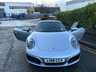 USED 2018 18 PORSCHE 911 3.0T 991 Carrera S Coupe 2dr Petrol PDK Euro 6 (s/s) (420 ps)-Factory Extras Worth �&pound;7,500.00-Superb Example-Finished In Rhodium Silver Metallic-Heated Black Leather Upholstery-Rev Counter Dial Face In Black-20 Inch Carrera Classic Alloy Wheels With Matching Pirelli P Zero Tyres-Heated Multifunction Steering Wheel-Front & Rear Park Assist-Electric Slide & Tilt Glass Sunroof-Electric Folding Exterior Door Mirrors-Isofix-Bose Surround Sound System-Sport Chrono Package-Factory Privacy Glass To Rear Side Windows & Rear Window-Porsche Crest On Headrests-Ready To Be Enjoyed For That European Road Trip... 