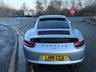 USED 2018 18 PORSCHE 911 3.0T 991 Carrera S Coupe 2dr Petrol PDK Euro 6 (s/s) (420 ps)-Factory Extras Worth �&pound;7,500.00-Superb Example-Finished In Rhodium Silver Metallic-Heated Black Leather Upholstery-Rev Counter Dial Face In Black-20 Inch Carrera Classic Alloy Wheels With Matching Pirelli P Zero Tyres-Heated Multifunction Steering Wheel-Front & Rear Park Assist-Electric Slide & Tilt Glass Sunroof-Electric Folding Exterior Door Mirrors-Isofix-Bose Surround Sound System-Sport Chrono Package-Factory Privacy Glass To Rear Side Windows & Rear Window-Porsche Crest On Headrests-Ready To Be Enjoyed For That European Road Trip... 