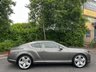 USED 2012 12 BENTLEY 6 1/2 LITRE 6.0 GT Coupe 2dr Auto 6 Speed 4WD Euro 5 (575 ps)-Fantastic Low Mileage Example,Finished In Granite Metallic With Linen Hide-Mulliner Driving Specification-Contrast Stitching-Mfsw-Dual Climate Control-Cruise Control-Satnav-Bluetooth-Burr Walnut Interior Trim-Keyless Entry-Veneer Door & Rear Quater Inserts-Cd Changer-Rear View Camera- 21 Inch 5 Spoke Two Piece Alloy Wheels-Great Colour Combination. 