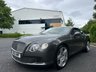USED 2012 12 BENTLEY 6 1/2 LITRE 6.0 GT Coupe 2dr Auto 6 Speed 4WD Euro 5 (575 ps)-Fantastic Low Mileage Example,Finished In Granite Metallic With Linen Hide-Mulliner Driving Specification-Contrast Stitching-Mfsw-Dual Climate Control-Cruise Control-Satnav-Bluetooth-Burr Walnut Interior Trim-Keyless Entry-Veneer Door & Rear Quater Inserts-Cd Changer-Rear View Camera- 21 Inch 5 Spoke Two Piece Alloy Wheels-Great Colour Combination. 