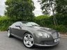 USED 2012 12 BENTLEY 6 1/2 LITRE 6.0 GT Coupe 2dr Auto 6 Speed 4WD Euro 5 (575 ps)-Fantastic Low Mileage Example,Finished In Granite Metallic With Linen Hide-Mulliner Driving Specification-Contrast Stitching-Mfsw-Dual Climate Control-Cruise Control-Satnav-Bluetooth-Burr Walnut Interior Trim-Keyless Entry-Veneer Door & Rear Quater Inserts-Cd Changer-Rear View Camera- 21 Inch 5 Spoke Two Piece Alloy Wheels-Great Colour Combination. 
