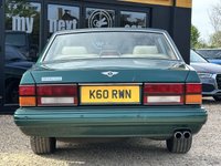 USED 1996 K BENTLEY BROOKLANDS 6.8 Saloon 4dr Petrol Automatic (409 g/km, 300 bhp) Sherwood Green, has subsequently invested a further &Acirc;&pound;12,000 in the last year, including new springs, new tyres and a battery,Further enhanced by the addition of LED headlights incorporating daytime running lights (original Halogen lamps included) and parking sensors,31,468 miles indicated, supported by its original stamped service book and book pack with 14 service stamps present,The Sherwood Green coachwork was professionally polished last y