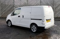 USED 2020 69 NISSAN e-NV200 Tekna Panel Van 40 KWH 5dr Electric Auto SWB (Quick Charge) (109 ps) FREE 3 YEAR WARRANTY COVER ON THIS VAN  .Presenting a low-mileage, meticulously specified electric van ready to transform your business efficiency. This 69 plate Nissan e-NV200 40kWh Tekna Panel Van combines proven reliability with the substantial cost-saving benefits of electric propulsion. It is the practical and intelligent choice for urban deliveries, trades, and service operators.  As the top-of-the-range Tekna model, this van comes fully equipped with essential premium features. Navigate with confidence using the integrated Satellite Navigation system. Enhance safety and manoeuvrability with the invaluable Reverse Parking Camera. Benefit from added security with the fitted High Security locking system, providing peace of mind for your tools and stock.  This van is not only specification-rich but also immediately operational. It includes a professional quality rear racking and shelving system, installed and ready for you to load and go, saving you significant time and upfront cost. The 40kWh battery offers a practical real-world range, perfectly suited for daily routes, and includes the crucial Quick Charge capability for rapid top-ups during the working day. With only 28,883 miles recorded, this automatic, short-wheelbase model represents a smart, future-focused investment.  Escape rising fuel costs and congestion charges. Step into a quieter, cleaner, and more economical way of working. This fully-equipped Nissan e-NV200 Tekna is prepared to work hard for your business. Contact us now to arrange a viewing and experience the electric advantage for yourself. 