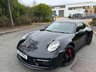 USED 2021 71 PORSCHE 911 3.0T 992 Carrera GTS Coupe PDK 2dr Petrol Euro 6 (s/s) (480 ps)-Full Body Paint Protection Film-Factory Extras Worth &pound;20,331-Fantastic Example-1 Former Keeper-Finished In Jet Black Metallic-Model Designation Painted In High Gloss Black-Power Steering Plus-Steering Column Casing In Leather-Exterior Package Painted In High Gloss Black-Heated Multifunction Gt Sports Steering Wheel In Leather With Matt Carbon Panel-Sports Seat Plus Backrests In Leather With Inlay In Matt Carbon-Front Axle Lift System-Ionizer-Exclusive Design Fuel Filler Cap-Belt Outlet Trims In Race-Tex Including Isofix-Electric Slide/Tilt Glass Sunroof-Porsche Crest On Headrests-Front Seat Ventilation-Windscreen With Grey Top Tint-Factory Privacy Glass-Extended Interior Package In Matt Carbon-Sun Visors & Roof Lining In Race-Tex-Model Logo On Storage Compartment Lid-Electric Folding Exterior Mirrors-Illuminated Door Sill Guards In Matt Carbon-Lane Change Assist-Led Main Headlights In Black With Matrix Beam Including PDLS Plus-Porsche Design Subsecond Clock-Adaptive Cruise Control-Exclusive Design Taillights-Bose Surround Sound System-Bordeaux Red Seat Belts-Vehicle Key Painted-Park Assist Including Surround View-Porsche Logo Painted In High Gloss Black-Automatic Dimming Interior & Exterior Mirrors-18 Way Electric Adaptive Sports Seats Plus-Storage Package-Window Trims In High Gloss Black-Light Design Package-Porsche Logo Led Door Courtesy Lights-Has To Be One Of The Best Specified 992 Gts Coupes Currently For Sale. 
