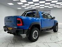 USED 2023 72 DODGE RAM 6.2L Finished In Hydro Blue, This Ram TRX Is A Rarity On The Roads, And Is The Pinnacle Of High Performance Trucks, This Left Hand Drive Comes With Harmon Kardon Premium Sound System, 12-Inch Infotainment Screen, 360 Degree Surround Camera, Performance Inspired Flat Bottom Steering Wheel, Panoramic Sunroof, Heads Up Display, Heated And Adjustable Seats, 12 Months Warranty 3 Months MOT. Finance And Extended Warranty Available