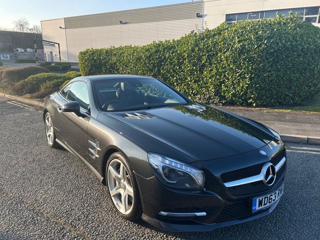 2013 63 Mercedes-Benz Sl 3.5 SL350 V6 BlueEfficiency Convertible 2dr Petrol G-Tronic Euro 5 (s/s) (306 ps)-2 Owner Car From New-Last Keeper Since March 2016-Finished In Magnetite Black Metallic-Heated Ebony Leather Upholstery-Active Parking Assist-Analogue Clock-Auto Dimming Rear View Mirror & Exterior Mirrors-Air Scarf-Ambient Lighting Function To Roof-7 Speed Automatic-Sports Suspension-Dab Radio-Satnav-Bluetooth-Mfsw-Dual Climate Control-Cruise Control-Auto High Beam Control-Black Ash Wood Interior Trim-19 Inch Amg Spoke Alloy Wheels-Amg Styling To Front Spoiler & Side Skirts-Magic Vision Control-Ambient Lighting-Superb Example With a Fantastic Mercedes Service Record.