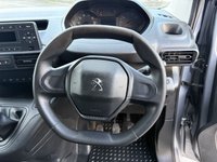 USED 2020 20 PEUGEOT PARTNER 1.5 BlueHDi 1000 Grip Standard Panel Van 5dr Diesel Manual SWB Euro 6 (s/s) (100 bhp) This 2020 Peugeot Partner van stands out with its remarkably low mileage of just 57,290 miles, especially considering its age, and has been owned by only one careful owner.  This Grip derivative, powered by an efficient 1.5L BlueHDi diesel engine, meets Euro 6 emission standards.  It comes equipped with practical features such as height adjustable halogen headlights that automatically illuminate, along with daytime running lights. Inside, you'll find the distinctive PEUGEOT i-CockpIT.