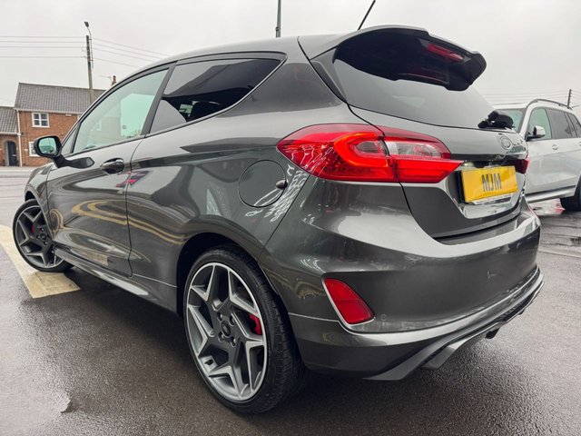 2020 FORD FIESTA 2020 1.5T EcoBoost ST-3 Hatchback 3dr Petrol Manual Euro 6 (s/s) (200 ps) * HUGE SPEC LIST * ST PERFORMANCE PACK * HEATED STEERING WHEEL * B&O SOUND SYSTEM * CRUISE CONTROL * APPLE CARPLAY * REAR CAMERA * HEATED RECARO SETAS * 18" MAGNETIC ALLOYS * PRIVACY GLASS * 4.2" DISPLAY * MAGNETIC GREY * QUICKCLEAR WINDSCREEN * RED BRAKE CALIPES * FORD SYNC 3 * ST SPORTS SUSPENSION * SAT NAV * DAB * STUNNING THROUGHOUT * - Photo 2