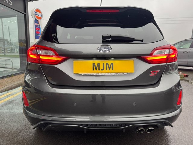 2020 FORD FIESTA 2020 1.5T EcoBoost ST-3 Hatchback 3dr Petrol Manual Euro 6 (s/s) (200 ps) * HUGE SPEC LIST * ST PERFORMANCE PACK * HEATED STEERING WHEEL * B&O SOUND SYSTEM * CRUISE CONTROL * APPLE CARPLAY * REAR CAMERA * HEATED RECARO SETAS * 18" MAGNETIC ALLOYS * PRIVACY GLASS * 4.2" DISPLAY * MAGNETIC GREY * QUICKCLEAR WINDSCREEN * RED BRAKE CALIPES * FORD SYNC 3 * ST SPORTS SUSPENSION * SAT NAV * DAB * STUNNING THROUGHOUT * - Photo 8