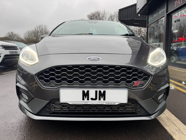 2020 FORD FIESTA 2020 1.5T EcoBoost ST-3 Hatchback 3dr Petrol Manual Euro 6 (s/s) (200 ps) * HUGE SPEC LIST * ST PERFORMANCE PACK * HEATED STEERING WHEEL * B&O SOUND SYSTEM * CRUISE CONTROL * APPLE CARPLAY * REAR CAMERA * HEATED RECARO SETAS * 18" MAGNETIC ALLOYS * PRIVACY GLASS * 4.2" DISPLAY * MAGNETIC GREY * QUICKCLEAR WINDSCREEN * RED BRAKE CALIPES * FORD SYNC 3 * ST SPORTS SUSPENSION * SAT NAV * DAB * STUNNING THROUGHOUT * - Photo 9