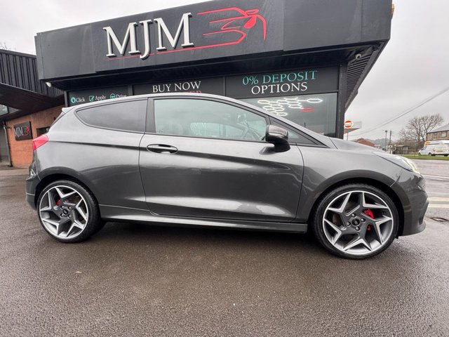2020 FORD FIESTA 2020 1.5T EcoBoost ST-3 Hatchback 3dr Petrol Manual Euro 6 (s/s) (200 ps) * HUGE SPEC LIST * ST PERFORMANCE PACK * HEATED STEERING WHEEL * B&O SOUND SYSTEM * CRUISE CONTROL * APPLE CARPLAY * REAR CAMERA * HEATED RECARO SETAS * 18" MAGNETIC ALLOYS * PRIVACY GLASS * 4.2" DISPLAY * MAGNETIC GREY * QUICKCLEAR WINDSCREEN * RED BRAKE CALIPES * FORD SYNC 3 * ST SPORTS SUSPENSION * SAT NAV * DAB * STUNNING THROUGHOUT * - Photo 10