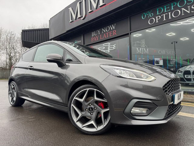 2020 FORD FIESTA 2020 1.5T EcoBoost ST-3 Hatchback 3dr Petrol Manual Euro 6 (s/s) (200 ps) * HUGE SPEC LIST * ST PERFORMANCE PACK * HEATED STEERING WHEEL * B&O SOUND SYSTEM * CRUISE CONTROL * APPLE CARPLAY * REAR CAMERA * HEATED RECARO SETAS * 18" MAGNETIC ALLOYS * PRIVACY GLASS * 4.2" DISPLAY * MAGNETIC GREY * QUICKCLEAR WINDSCREEN * RED BRAKE CALIPES * FORD SYNC 3 * ST SPORTS SUSPENSION * SAT NAV * DAB * STUNNING THROUGHOUT *
