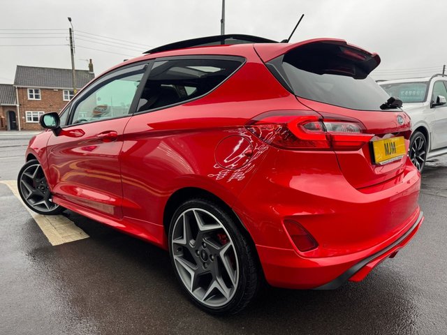 2020 FORD FIESTA 2020 1.5T EcoBoost ST-3 Hatchback 3dr Petrol Manual Euro 6 (200 ps) * HUGE SPEC LIST * PANORAMIC SUNROOF * HEATED STEERING WHEEL * ST PERFORMANCE PACK * B&O SOUND SYSTEM * LED LIGHTS * CRUISE CONTROL * APPLE CARPLAY * REAR CAMERA * HEATED RECARO SETAS * 18" MAGNETIC ALLOYS * PRIVACY GLASS * 4.2" DISPLAY * RACE RED * QUICKCLEAR WINDSCREEN * RED BRAKE CALIPES * FORD SYNC 3 * ST SPORTS SUSPENSION * SAT NAV * DAB * STUNNING THROUGHOUT * - Photo 2