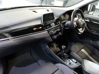USED 2018 68 BMW X1 1.5 18i GPF Sport SUV 5dr Petrol Manual sDrive Euro 6 (s/s) (140 ps) GOOD LOOKING SUV - VERY CLEAN THROUGHOUT - COMES WITH A DOCUMENTED BMW MAIN DEALER SERVICE HISTORY + SATELLITE NAVIGATION + BLUETOOTH PHONE CONNECTIVITY INCLUDING MEDIA STREAMING + DAB DIGITAL RADIO + KEYLESS START + CRUISE CONTROL + PARKING SENSORS + IN CAR ENTERTAINMENT WITH MEDIA DISPLAY + DAY TIME RUNNING LIGHTS + ECO STOP START SYSTEM + DUAL ZONE CLIMATE CONTROL + AIR CONDITIONING + LEATHER MULTI FUNCTION STEERING WHEEL + VOICE COMMAND + SELECTABLE DRIVING MODES + HILL HOLD START ASSIST + R