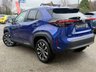 USED 2022 72 TOYOTA YARIS CROSS 1.5 VVT-h Design SUV 5dr Petrol Hybrid E-CVT Euro 6 (s/s) (116 ps) Finished in GALACTIC BLUE MET, with  Sports Cloth Trim. This is a handsome compact SUV with an extremely economical hybrid powertrain. If the regular Yaris small car isn&rsquo;t quite butch enough for you, then cast your eyes over this Yaris Cross. Features include, Sat Nav, Rear View Camera, 17" Alloys, DAB Radio, B/Tooth, Power Folding Mirrors and more. Dealer serviced at 10814 miles, 21056 miles, 29994 miles, and at 33014 miles.