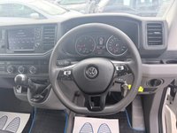 USED 2019 69 VOLKSWAGEN CRAFTER White 2.0 TDI Euro 6 panel van, 133.700 miles, ULEZ compliant, 6-Speed manual, 8in Touchscreen, DAB, Cruise and much more! Plus VAT @ 20%! This 2019 Volkswagen Crafter offers excellent peace of mind with a 3 month warranty and a full 12 months MOT provided on purchase. This particular Crafter is the 2.0 TDI CR35 Trendline FWD MWB Euro 6 model, featuring a robust 2.0 litre diesel engine that produces 138 bhp. The Trendline trim level ensures a comfortable and functional driving experience, enhanced by the Composition Media system which includes DAB+ radio and an 8 inch touch screen with Bluetooth connectivity for seamless phone inte