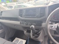 USED 2019 69 VOLKSWAGEN CRAFTER White 2.0 TDI Euro 6 panel van, 133.700 miles, ULEZ compliant, 6-Speed manual, 8in Touchscreen, DAB, Cruise and much more! Plus VAT @ 20%! This 2019 Volkswagen Crafter offers excellent peace of mind with a 3 month warranty and a full 12 months MOT provided on purchase. This particular Crafter is the 2.0 TDI CR35 Trendline FWD MWB Euro 6 model, featuring a robust 2.0 litre diesel engine that produces 138 bhp. The Trendline trim level ensures a comfortable and functional driving experience, enhanced by the Composition Media system which includes DAB+ radio and an 8 inch touch screen with Bluetooth connectivity for seamless phone inte