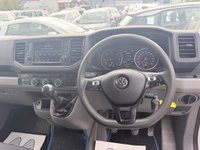 USED 2019 69 VOLKSWAGEN CRAFTER White 2.0 TDI Euro 6 panel van, 133.700 miles, ULEZ compliant, 6-Speed manual, 8in Touchscreen, DAB, Cruise and much more! Plus VAT @ 20%! This 2019 Volkswagen Crafter offers excellent peace of mind with a 3 month warranty and a full 12 months MOT provided on purchase. This particular Crafter is the 2.0 TDI CR35 Trendline FWD MWB Euro 6 model, featuring a robust 2.0 litre diesel engine that produces 138 bhp. The Trendline trim level ensures a comfortable and functional driving experience, enhanced by the Composition Media system which includes DAB+ radio and an 8 inch touch screen with Bluetooth connectivity for seamless phone inte