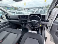 USED 2019 69 VOLKSWAGEN CRAFTER White 2.0 TDI Euro 6 panel van, 133.700 miles, ULEZ compliant, 6-Speed manual, 8in Touchscreen, DAB, Cruise and much more! Plus VAT @ 20%! This 2019 Volkswagen Crafter offers excellent peace of mind with a 3 month warranty and a full 12 months MOT provided on purchase. This particular Crafter is the 2.0 TDI CR35 Trendline FWD MWB Euro 6 model, featuring a robust 2.0 litre diesel engine that produces 138 bhp. The Trendline trim level ensures a comfortable and functional driving experience, enhanced by the Composition Media system which includes DAB+ radio and an 8 inch touch screen with Bluetooth connectivity for seamless phone inte