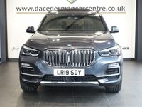 USED 2019 19 BMW X5 3.0 40i xLine SUV 5dr Petrol Auto xDrive Euro 6 (s/s) (340 ps) BEAUTIFUL 7 SEAT UPGRADE MODEL X5 + 1 OWNER FROM NEW AND COMES WITH A BMW MAIN DEALER SERVICE HISTORY + SKY LOUNGE PANORAMIC SLIDING GLASS SUNROOF + 7 SEATER + VIRTUAL COCKPIT DIGITAL DASH DISPLAY + SATELLITE NAVIGATION + APPLE CARPLAY / APPS CONTROL + REAR VIEW CAMERA + FRONT AND REAR PARKING SENSORS + BLUETOOTH PHONE AND MEDIA CONNECTIVITY + HEATED MEMORY SEATS + IN CAR ENTERTAINMENT + 20 INCH ALLOYS + SELECTABLE DRIVING MODES + DESCENT ASSIST + DUAL ZONE CLIMATE CONTROL + AMBIENT LIGHTS +