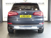 USED 2019 19 BMW X5 3.0 40i xLine SUV 5dr Petrol Auto xDrive Euro 6 (s/s) (340 ps) BEAUTIFUL 7 SEAT UPGRADE MODEL X5 + 1 OWNER FROM NEW AND COMES WITH A BMW MAIN DEALER SERVICE HISTORY + SKY LOUNGE PANORAMIC SLIDING GLASS SUNROOF + 7 SEATER + VIRTUAL COCKPIT DIGITAL DASH DISPLAY + SATELLITE NAVIGATION + APPLE CARPLAY / APPS CONTROL + REAR VIEW CAMERA + FRONT AND REAR PARKING SENSORS + BLUETOOTH PHONE AND MEDIA CONNECTIVITY + HEATED MEMORY SEATS + IN CAR ENTERTAINMENT + 20 INCH ALLOYS + SELECTABLE DRIVING MODES + DESCENT ASSIST + DUAL ZONE CLIMATE CONTROL + AMBIENT LIGHTS +
