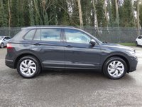 USED 2021 71 VOLKSWAGEN TIGUAN 1.5 TSI Life 5d 150 S/S SAT NAV, WIRELESS APP CONNECT FOR APPLE CARPLAY / ANDROID AUTO, LANE ASSIST, ADAPTIVE CRUISE CONTROL & SPEED LIMITER, DAB RADIO, BLUETOOTH, FRONT & REAR PARKING SENSORS, AUTO LIGHTS & WIPERS, AUTO HOLD, ELECTRIC HEATED DOOR MIRRORS, 18 INCH ALLOYS, BLACK ROOF RAILS, LEATHER FLAT BOTTOM MULTIFUNCTION STEERING WHEEL, 3  ZONE CLIMATE CONTROL A/C, ILLUMINATING VANITY MIRRORS, CLOTH INTERIOR, FRONT & REAR ARM RESTS, 1 OWNER, SERVICE HISTORY, MANUAL 6 SPEED GEARBOX, START STOP TECHNOLOGY