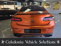 USED 2023 73 MERCEDES-BENZ E-CLASS 2.0 E300dh MHEV AMG Line Night Edition (Premium Plus) Coupe 2dr Diesel Hybrid G-Tronic+ 4MATIC Euro 6 (s/s) (285 ps) WRAPPED IN PAPRIKA ORANGE