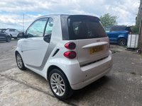 USED 2011 11 SMART FORTWO 1.0 MHD PASSION NAV SOFT TOUCH AUTOMATIC COUPE 2 DOOR *AUTOMATIC*ONLY &pound;20 ROAD TAX*GLASS PANORAMIC ROOF*SAT NAV*AIR CON*ALLOY WHEELS*THE CAR HAS HAD 8 SERVICES AND COMES WITH BRAND NEW MOT AND SERVICE*