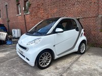 USED 2011 11 SMART FORTWO 1.0 MHD PASSION NAV SOFT TOUCH AUTOMATIC COUPE 2 DOOR *AUTOMATIC*ONLY &pound;20 ROAD TAX*GLASS PANORAMIC ROOF*SAT NAV*AIR CON*ALLOY WHEELS*THE CAR HAS HAD 8 SERVICES AND COMES WITH BRAND NEW MOT AND SERVICE*