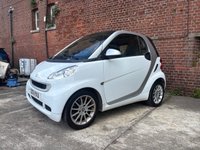 USED 2011 11 SMART FORTWO 1.0 MHD PASSION NAV SOFT TOUCH AUTOMATIC COUPE 2 DOOR *AUTOMATIC*ONLY &pound;20 ROAD TAX*GLASS PANORAMIC ROOF*SAT NAV*AIR CON*ALLOY WHEELS*THE CAR HAS HAD 8 SERVICES AND COMES WITH BRAND NEW MOT AND SERVICE*