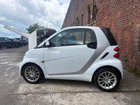 USED 2011 11 SMART FORTWO 1.0 MHD PASSION NAV SOFT TOUCH AUTOMATIC COUPE 2 DOOR *AUTOMATIC*ONLY &pound;20 ROAD TAX*GLASS PANORAMIC ROOF*SAT NAV*AIR CON*ALLOY WHEELS*THE CAR HAS HAD 8 SERVICES AND COMES WITH BRAND NEW MOT AND SERVICE*