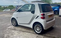 USED 2011 11 SMART FORTWO 1.0 MHD PASSION NAV SOFT TOUCH AUTOMATIC COUPE 2 DOOR *AUTOMATIC*ONLY &pound;20 ROAD TAX*GLASS PANORAMIC ROOF*SAT NAV*AIR CON*ALLOY WHEELS*THE CAR HAS HAD 8 SERVICES AND COMES WITH BRAND NEW MOT AND SERVICE*