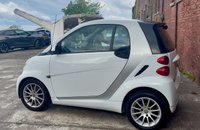 USED 2011 11 SMART FORTWO 1.0 MHD PASSION NAV SOFT TOUCH AUTOMATIC COUPE 2 DOOR *AUTOMATIC*ONLY &pound;20 ROAD TAX*GLASS PANORAMIC ROOF*SAT NAV*AIR CON*ALLOY WHEELS*THE CAR HAS HAD 8 SERVICES AND COMES WITH BRAND NEW MOT AND SERVICE*