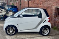 USED 2011 11 SMART FORTWO 1.0 MHD PASSION NAV SOFT TOUCH AUTOMATIC COUPE 2 DOOR *AUTOMATIC*ONLY &pound;20 ROAD TAX*GLASS PANORAMIC ROOF*SAT NAV*AIR CON*ALLOY WHEELS*THE CAR HAS HAD 8 SERVICES AND COMES WITH BRAND NEW MOT AND SERVICE*
