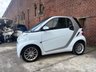 USED 2011 11 SMART FORTWO 1.0 MHD PASSION NAV SOFT TOUCH AUTOMATIC COUPE 2 DOOR *AUTOMATIC*ONLY &pound;20 ROAD TAX*GLASS PANORAMIC ROOF*SAT NAV*AIR CON*ALLOY WHEELS*THE CAR HAS HAD 8 SERVICES AND COMES WITH BRAND NEW MOT AND SERVICE*
