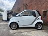USED 2011 11 SMART FORTWO 1.0 MHD PASSION NAV SOFT TOUCH AUTOMATIC COUPE 2 DOOR *AUTOMATIC*ONLY &pound;20 ROAD TAX*GLASS PANORAMIC ROOF*SAT NAV*AIR CON*ALLOY WHEELS*THE CAR HAS HAD 8 SERVICES AND COMES WITH BRAND NEW MOT AND SERVICE*