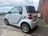 USED 2011 11 SMART FORTWO 1.0 MHD PASSION NAV SOFT TOUCH AUTOMATIC COUPE 2 DOOR *AUTOMATIC*ONLY &pound;20 ROAD TAX*GLASS PANORAMIC ROOF*SAT NAV*AIR CON*ALLOY WHEELS*THE CAR HAS HAD 8 SERVICES AND COMES WITH BRAND NEW MOT AND SERVICE*