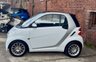 USED 2011 11 SMART FORTWO 1.0 MHD PASSION NAV SOFT TOUCH AUTOMATIC COUPE 2 DOOR *AUTOMATIC*ONLY &pound;20 ROAD TAX*GLASS PANORAMIC ROOF*SAT NAV*AIR CON*ALLOY WHEELS*THE CAR HAS HAD 8 SERVICES AND COMES WITH BRAND NEW MOT AND SERVICE*