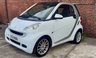 USED 2011 11 SMART FORTWO 1.0 MHD PASSION NAV SOFT TOUCH AUTOMATIC COUPE 2 DOOR *AUTOMATIC*ONLY &pound;20 ROAD TAX*GLASS PANORAMIC ROOF*SAT NAV*AIR CON*ALLOY WHEELS*THE CAR HAS HAD 8 SERVICES AND COMES WITH BRAND NEW MOT AND SERVICE*
